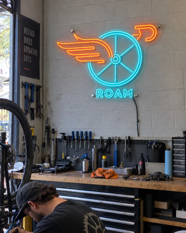 Workshop — Wheel Wings — Roam — Workshop · ROAM · graphic-led shop scene