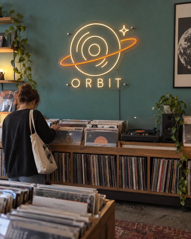 Music store — Record Orbit — Orbit — Music store · ORBIT · graphic-led shop scene